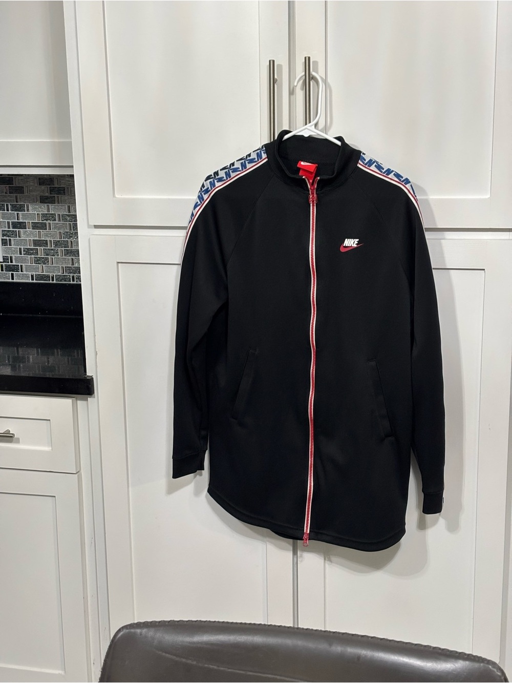Nike Men's Black Track Jacket with Red Trim Size Small oversized